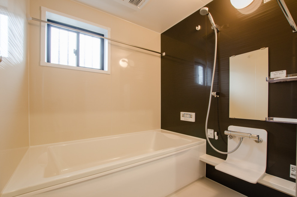 Mid-sized contemporary master wet room bathroom in Other with an alcove tub, brown walls, a sliding shower screen, white benchtops, panelled walls and white cabinets.