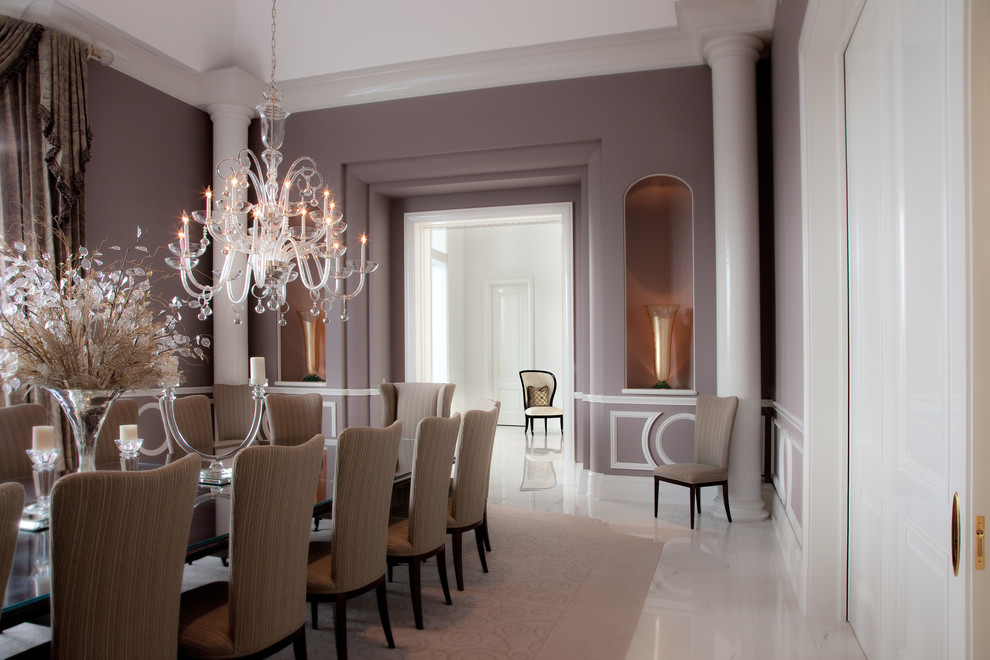 Large traditional separate dining room in Chicago with purple walls, marble floors, no fireplace and white floor.