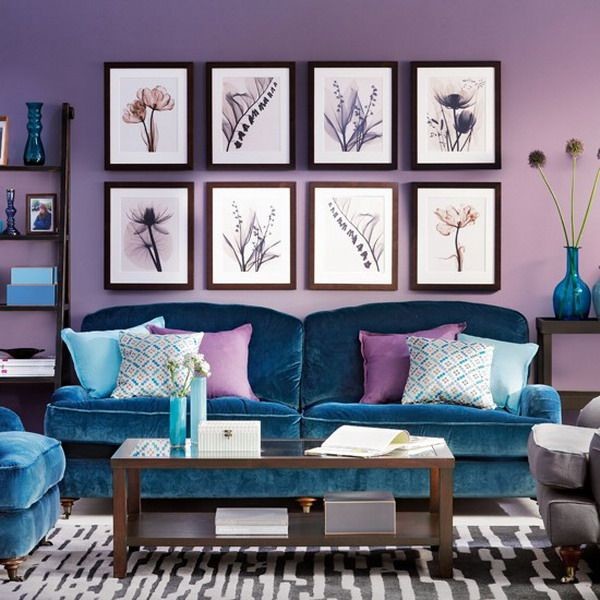 Photo of an eclectic living room in Las Vegas with purple walls.