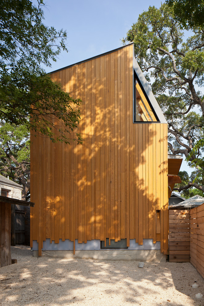 Inspiration for a contemporary exterior in Austin with wood siding.