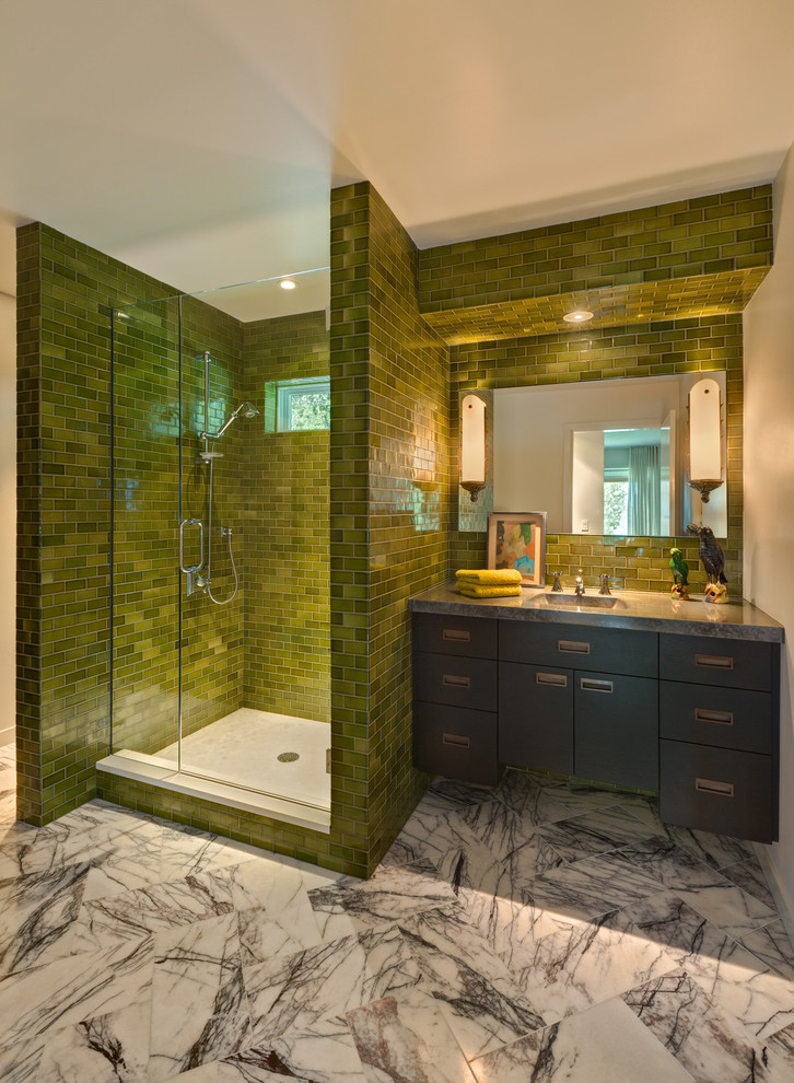 Midcentury bathroom in Portland with flat-panel cabinets, black cabinets, an alcove shower, green tile, subway tile and grey benchtops.