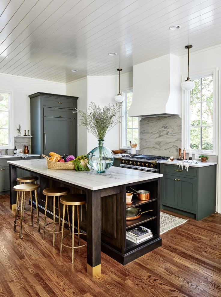 This is an example of a large transitional separate kitchen in DC Metro with an undermount sink, beaded inset cabinets, green cabinets, quartzite benchtops, grey splashback, shiplap splashback, coloured appliances, medium hardwood floors, with island, brown floor, grey benchtop and timber.
