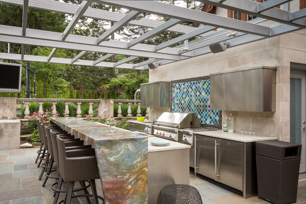 Inspiration for a contemporary patio in Detroit with a pergola.