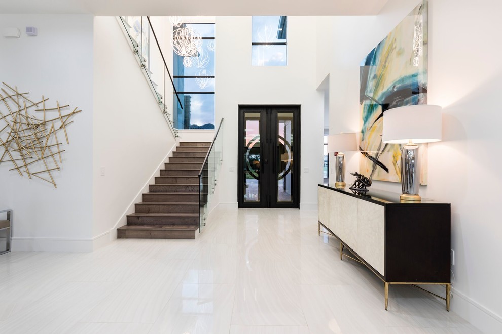 Zimmerman Project - This stupendous two-story foyer makes a dramatic first impression when you enter this lovely modern home.
