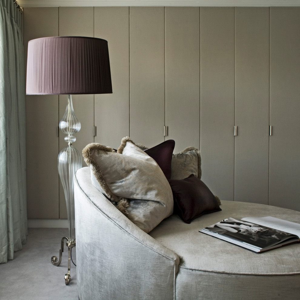 This is an example of a medium sized contemporary guest bedroom in London.