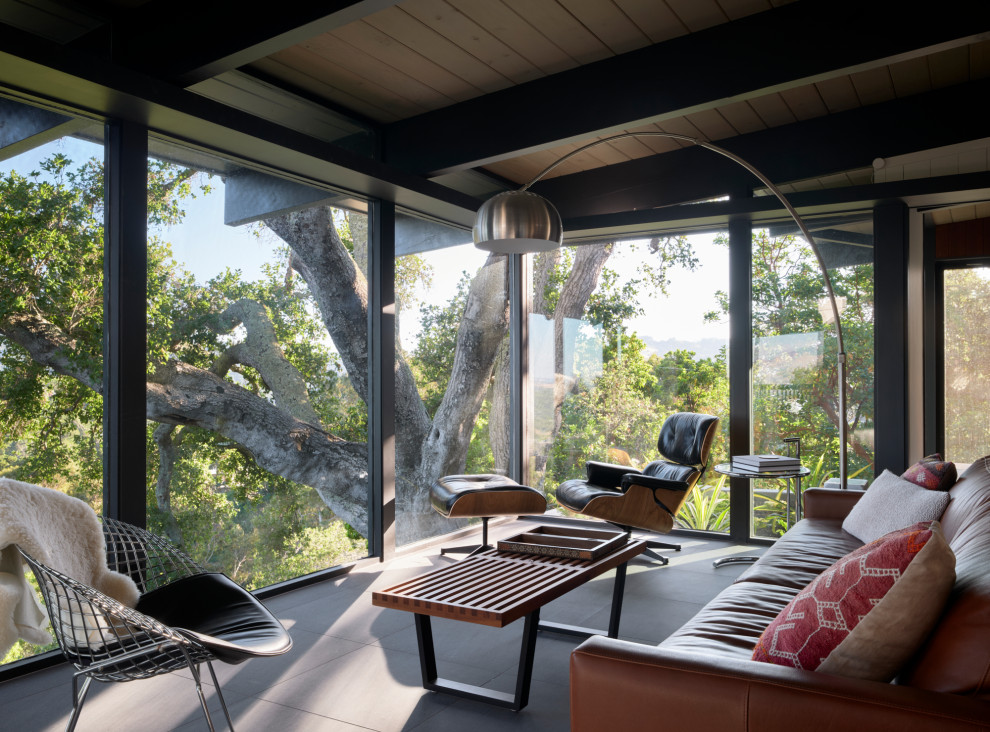 1950s gray floor, exposed beam and wood ceiling family room photo in San Francisco