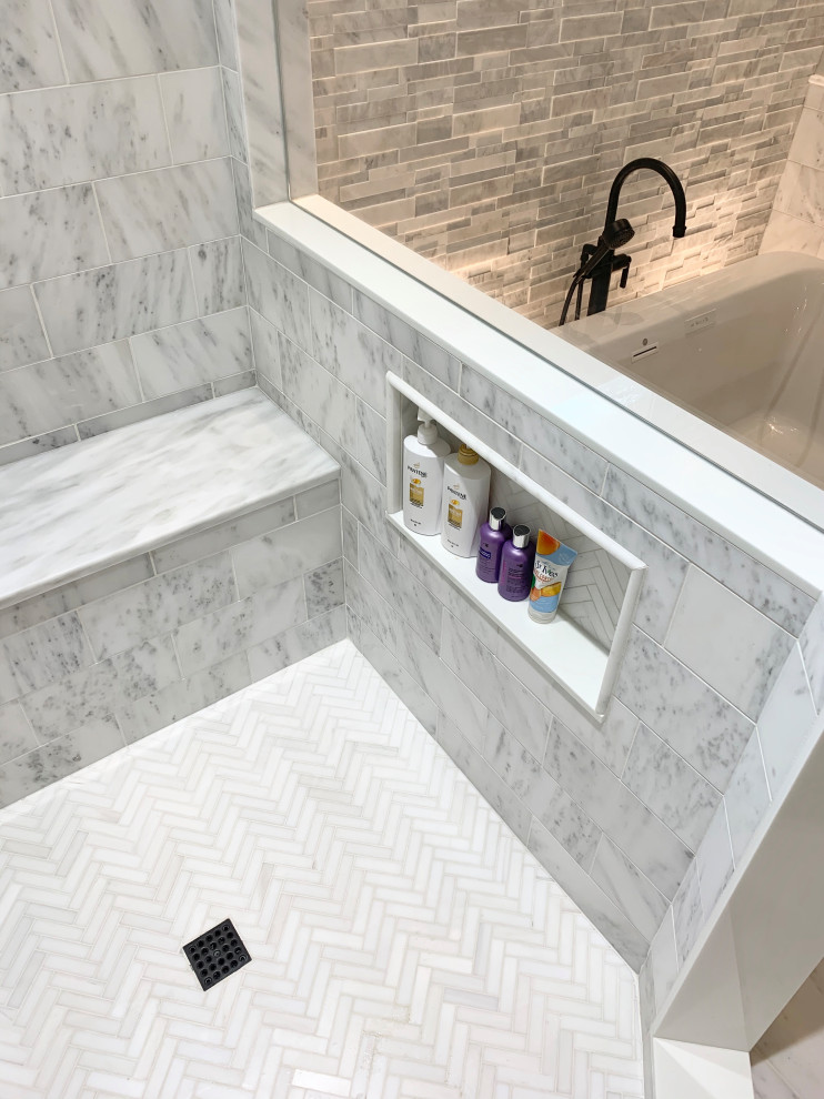 Photo of a large traditional master bathroom in Atlanta with beaded inset cabinets, white cabinets, a freestanding tub, a corner shower, a two-piece toilet, white tile, marble, grey walls, marble floors, an undermount sink, marble benchtops, white floor, a hinged shower door, grey benchtops, a shower seat, a double vanity, a built-in vanity, timber and planked wall panelling.