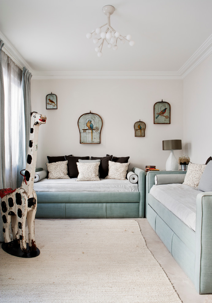 Kids' bedroom - bedroom and mid-sized transitional gender-neutral travertine floor kids' bedroom idea in Madrid with pink walls