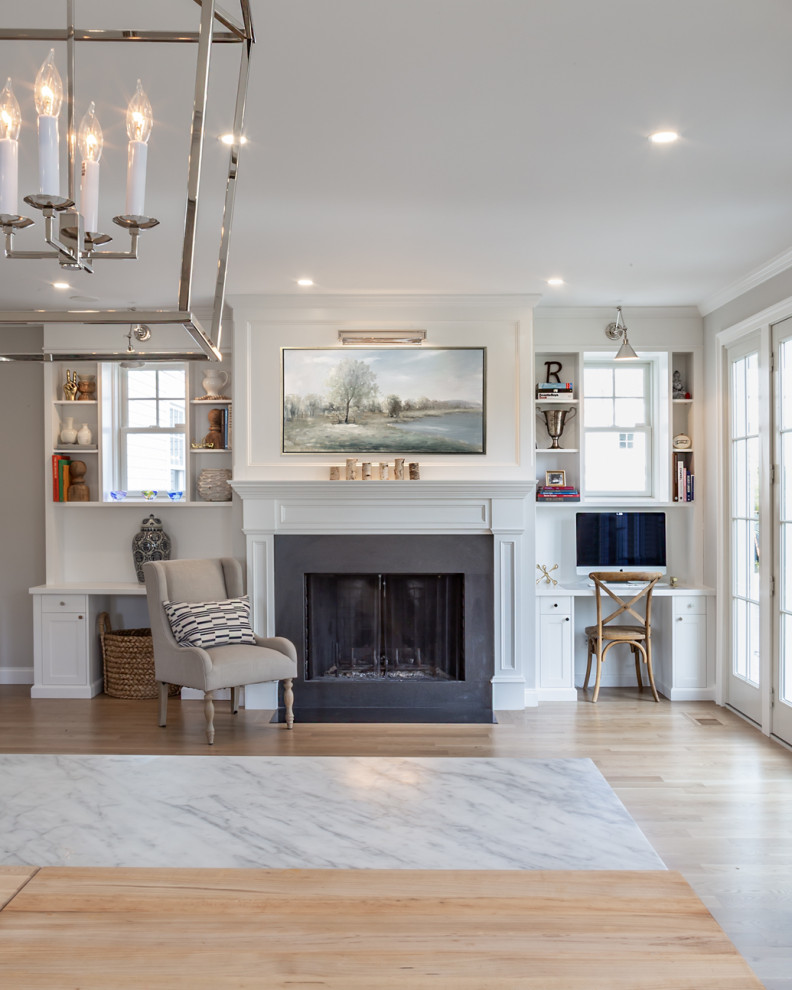 Inspiration for a large traditional formal open plan living room in Boston with white walls and a concealed tv.