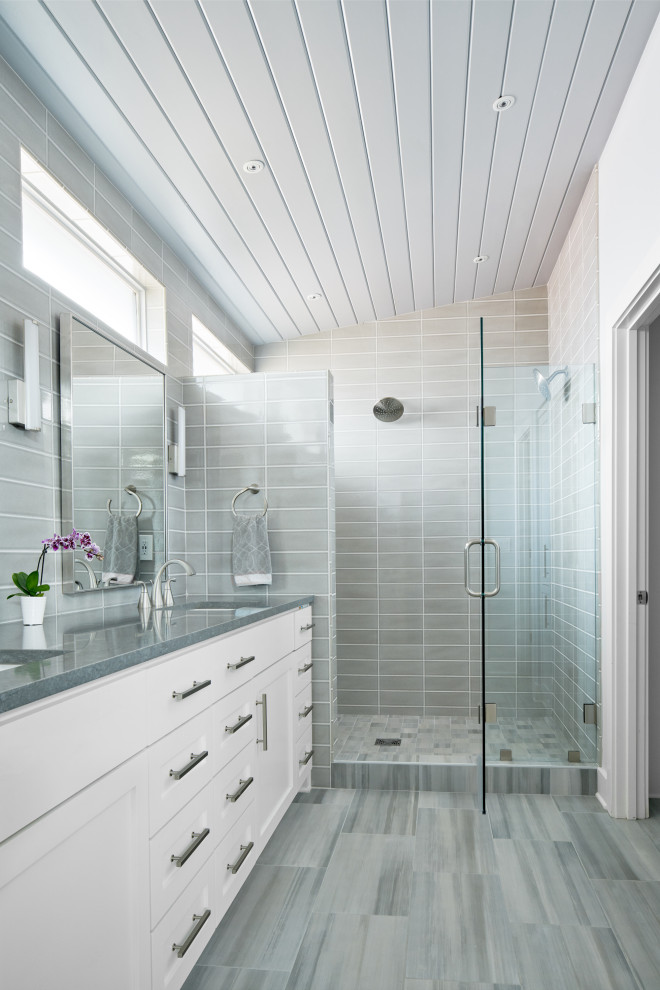 Inspiration for a mid-sized midcentury master bathroom in Austin with shaker cabinets, white cabinets, a double shower, gray tile, ceramic tile, white walls, ceramic floors, an undermount sink, quartzite benchtops, grey floor, a hinged shower door, grey benchtops, a double vanity, a built-in vanity and timber.