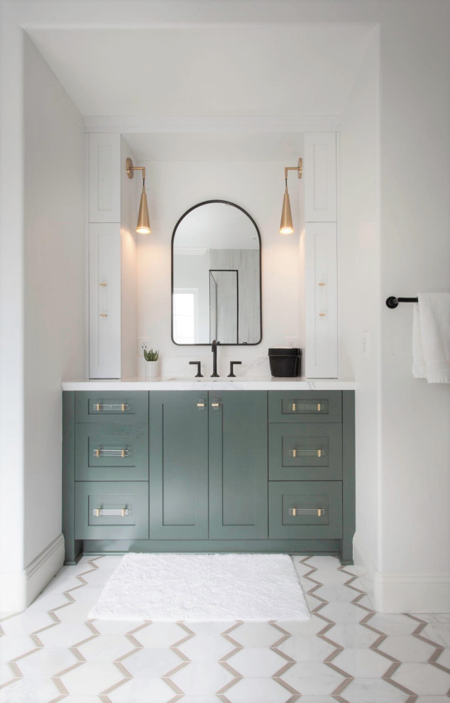 Design ideas for a mid-sized master bathroom in Denver with recessed-panel cabinets, green cabinets, a freestanding tub, an open shower, a two-piece toilet, white tile, porcelain tile, white walls, porcelain floors, an undermount sink, engineered quartz benchtops, white floor, a hinged shower door, white benchtops, a single vanity, a built-in vanity, wallpaper and wallpaper.