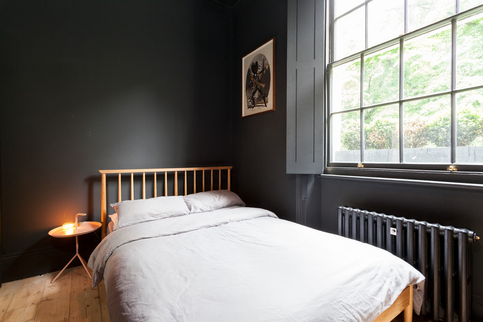 Photo of a scandinavian bedroom in London.