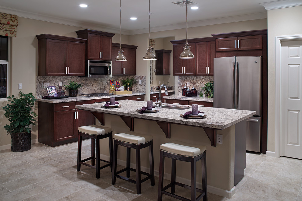 Transitional ceramic tile and beige floor kitchen photo with dark wood cabinets, granite countertops, gray backsplash, stainless steel appliances and an island