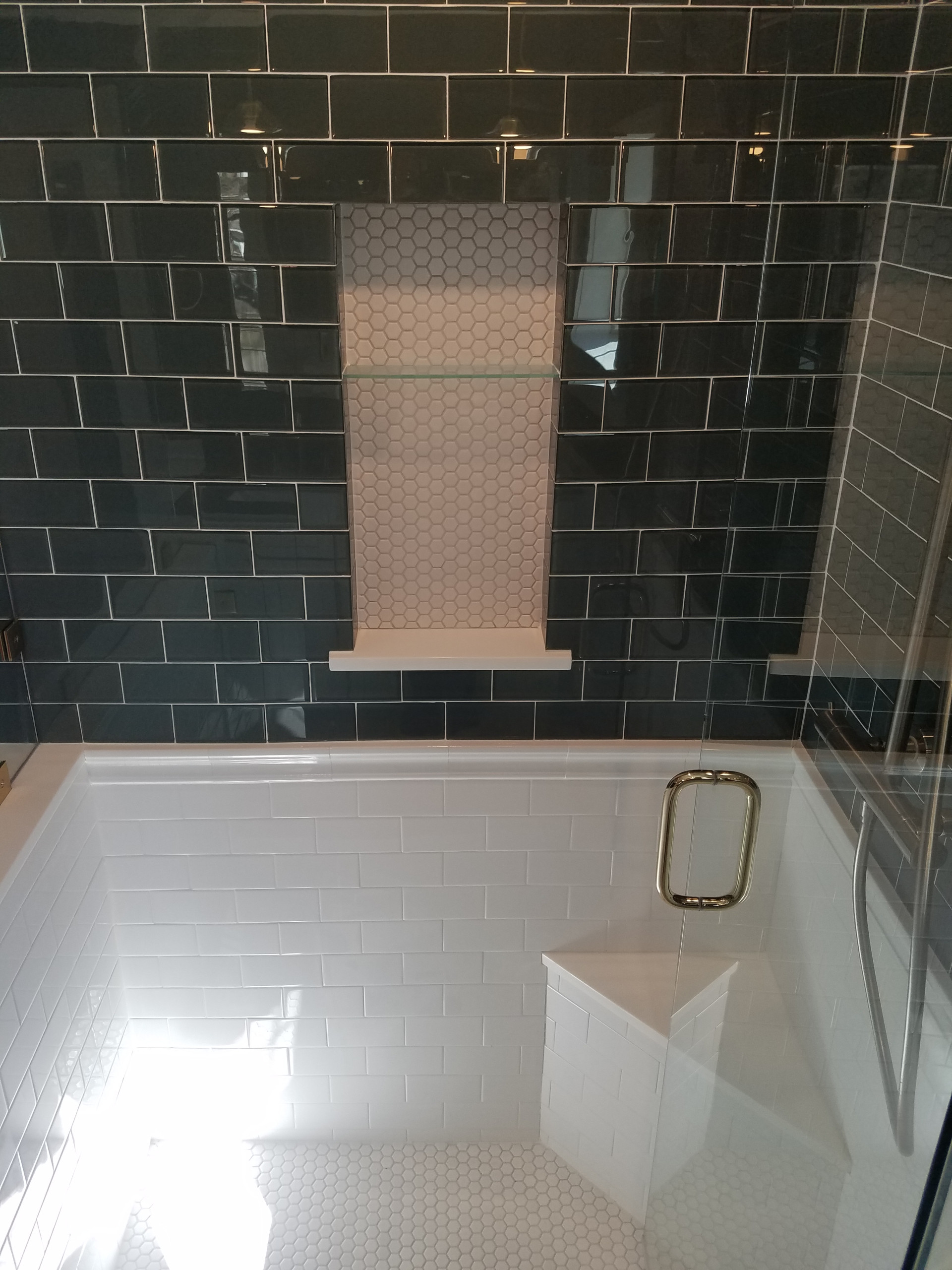 The client's goal was to rework the existing floor plan to create their dream master suite. They wanted to the master suite remodel to include a full tile shower, soaker tub, and a walk-in closet atta