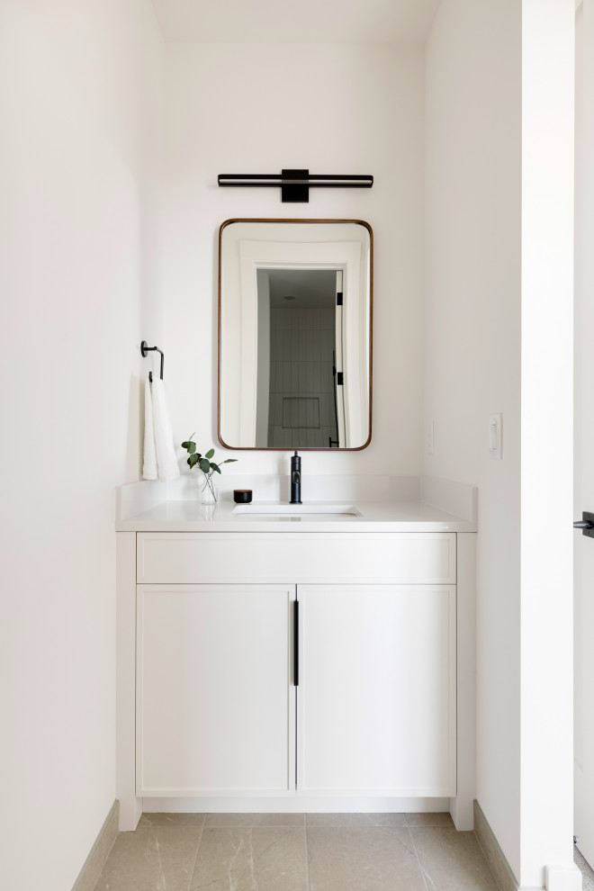Design ideas for a contemporary kids bathroom in Minneapolis with white cabinets, a shower/bathtub combo, an undermount sink, quartzite benchtops, beige floor, a shower curtain, white benchtops, a single vanity and a floating vanity.