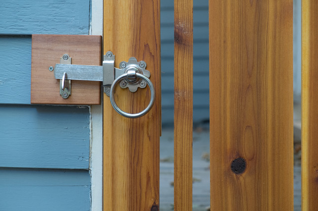 Traditional ring gate latch in 316 stainless steel on wood Traditional ring gate latch in 316 stainless steel on wood