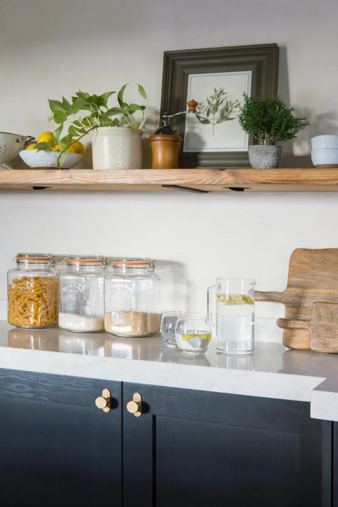 Inspiration for a transitional home bar in Kent.