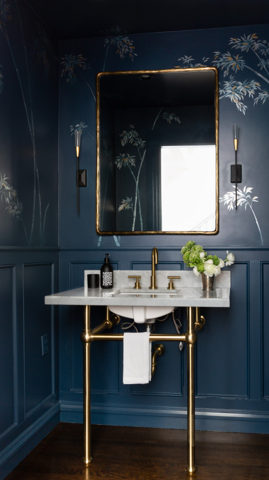Photo of a traditional bathroom in San Francisco with blue walls, dark hardwood floors, marble benchtops, brown floor, a single vanity and a freestanding vanity.