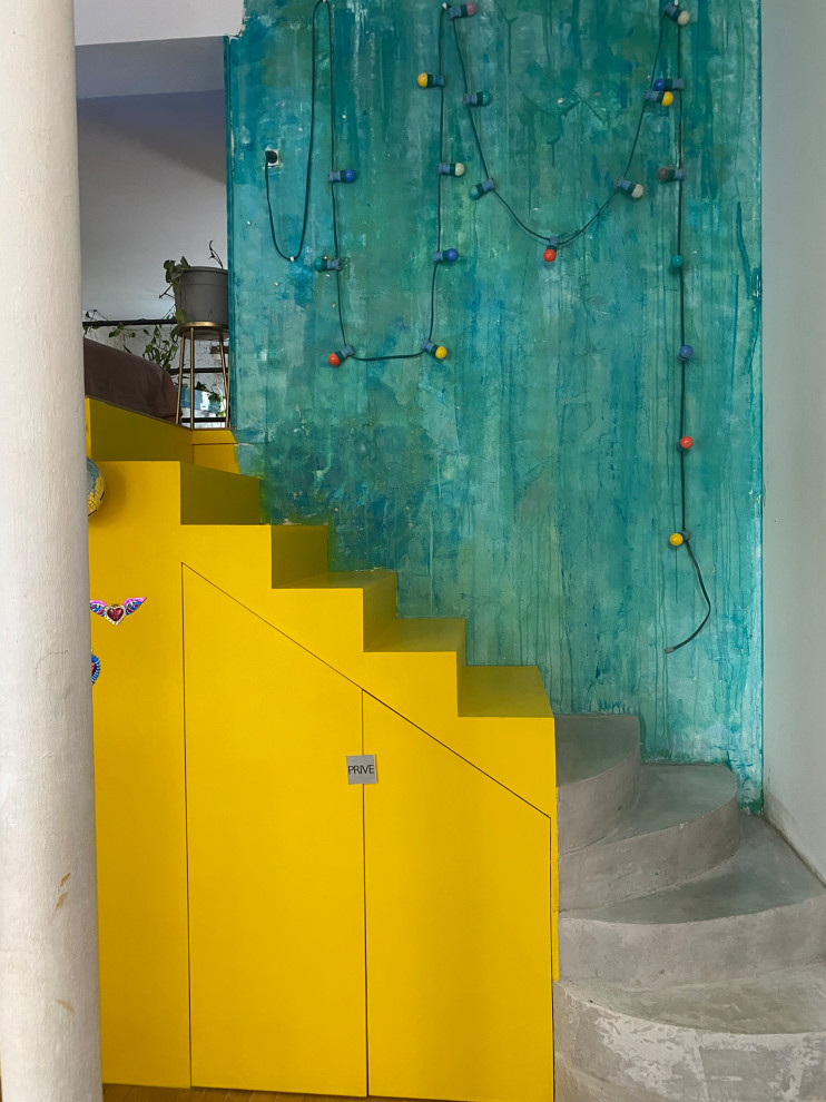 Transformation d'un local en loft brutaliste tropical