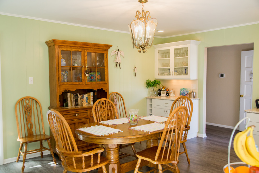 Photo of a small transitional open plan dining in Denver with linoleum floors.