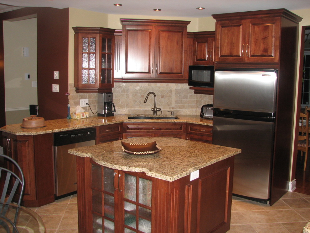 Large mountain style u-shaped ceramic tile open concept kitchen photo in Ottawa with an undermount sink, recessed-panel cabinets, medium tone wood cabinets, granite countertops, beige backsplash, ceramic backsplash, stainless steel appliances and an island
