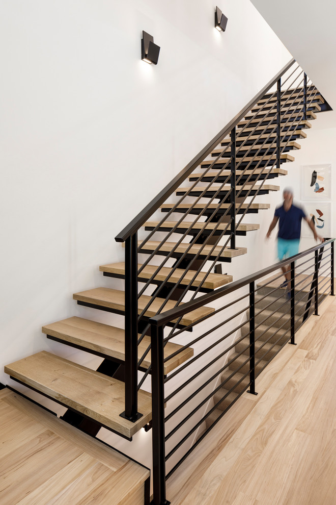 Staircase - mid-sized scandinavian staircase idea in Minneapolis
