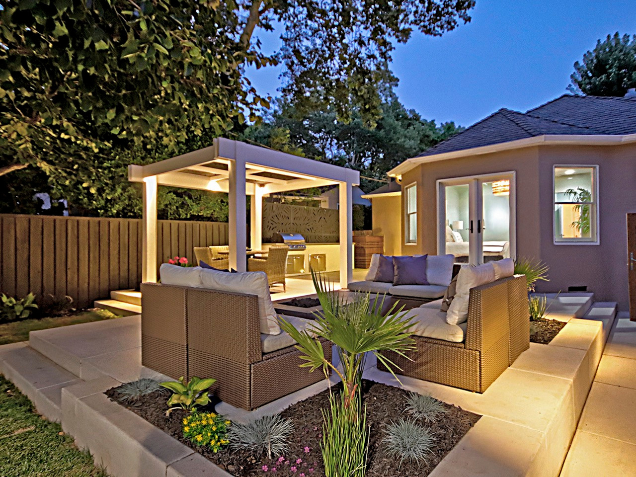 Modern Backyard Living with Custom Pergola, Outdoor Kitchen, and Lighting