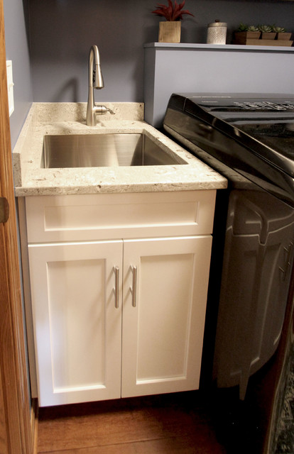 Laundry Room With White Cabinets And Rushbrook Quartz Countertop