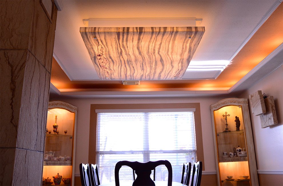 Example of a transitional dining room design in Phoenix with beige walls