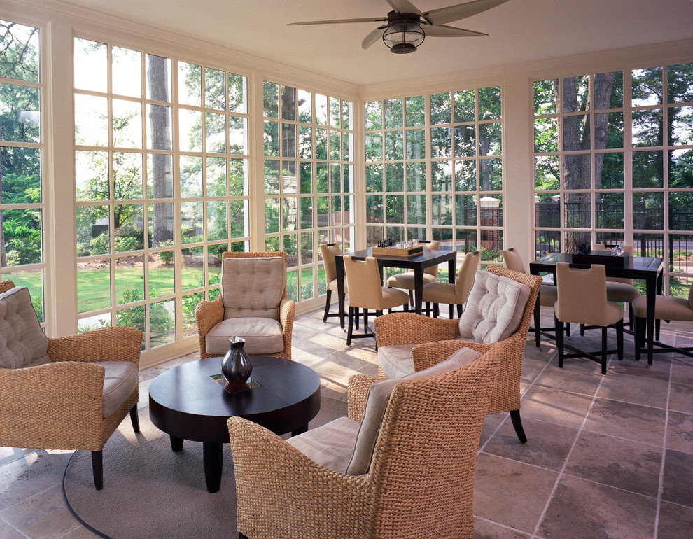 Inspiration for a transitional tile porch remodel in Atlanta with a roof extension