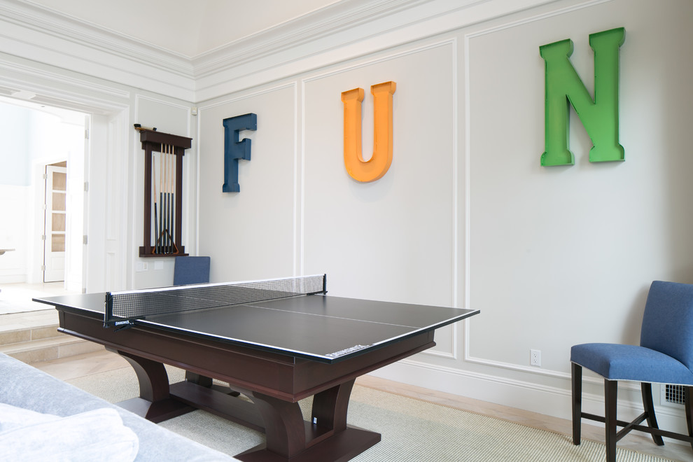 Inspiration for a traditional family room in Orange County with a game room.