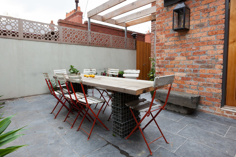 Inspiration for a large traditional courtyard patio in Melbourne with a vegetable garden.