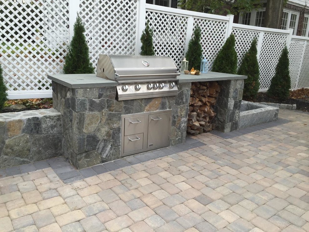 Patio - mid-sized transitional backyard concrete paver patio idea in Orange County with a fire pit and no cover