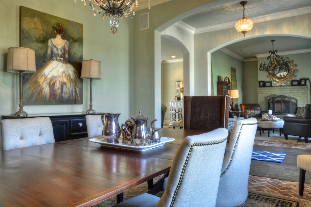 Inspiration for a mid-sized traditional separate dining room in Dallas with brick floors.