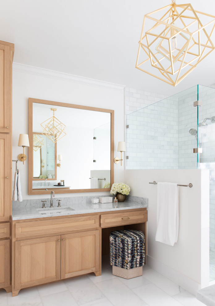 Design ideas for a mid-sized contemporary master wet room bathroom in Austin with shaker cabinets, a drop-in tub, white walls, marble floors, an undermount sink, granite benchtops, white floor, a hinged shower door, a single vanity and a built-in vanity.