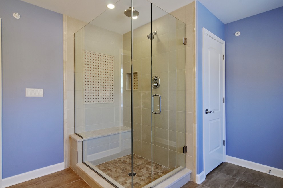 Mid-sized transitional master bathroom in Chicago with an undermount sink, recessed-panel cabinets, white cabinets, granite benchtops, a freestanding tub, an open shower, beige tile, porcelain tile, blue walls and porcelain floors.