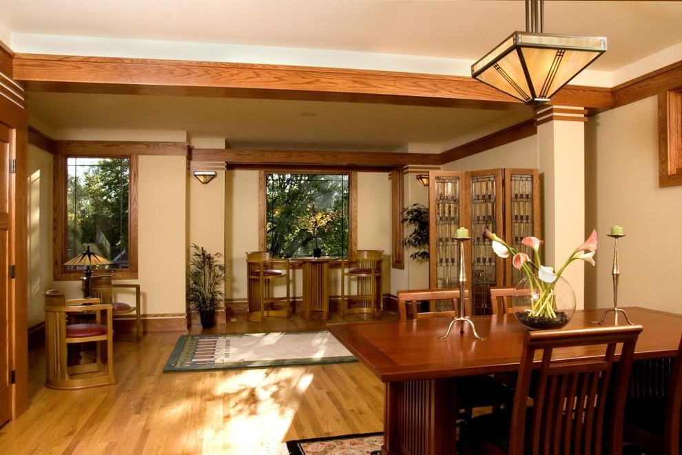 Asian dining room in Chicago with light hardwood floors.
