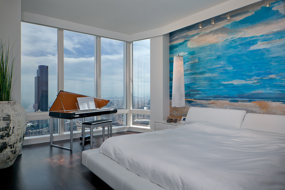 This is an example of a contemporary bedroom in San Francisco with white walls.