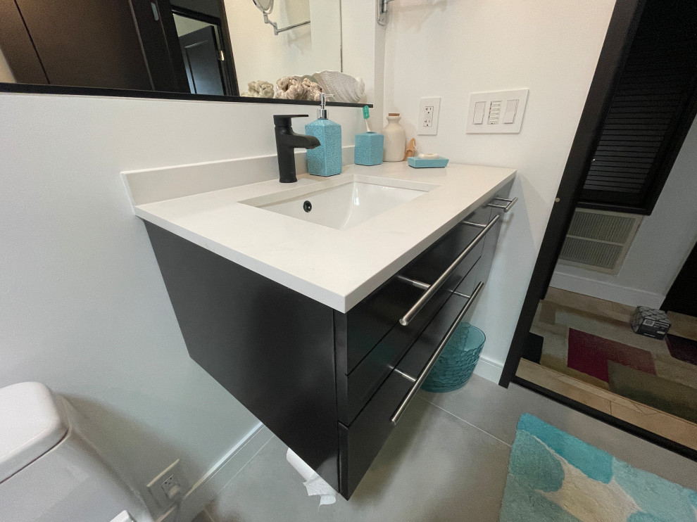 Design ideas for a small contemporary bathroom in San Francisco with flat-panel cabinets, dark wood cabinets, a built-in shower, a bidet, white tiles, white walls, porcelain flooring, a submerged sink, engineered stone worktops, grey floors, an open shower, white worktops, a wall niche, a single sink and a floating vanity unit.