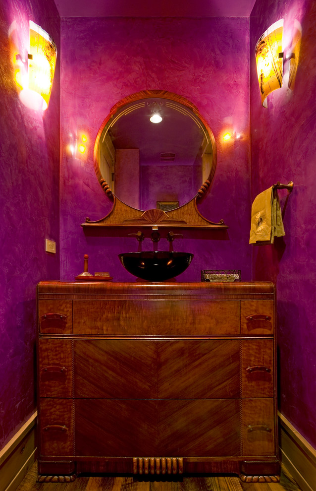 Photo of an eclectic powder room in Denver with a vessel sink.