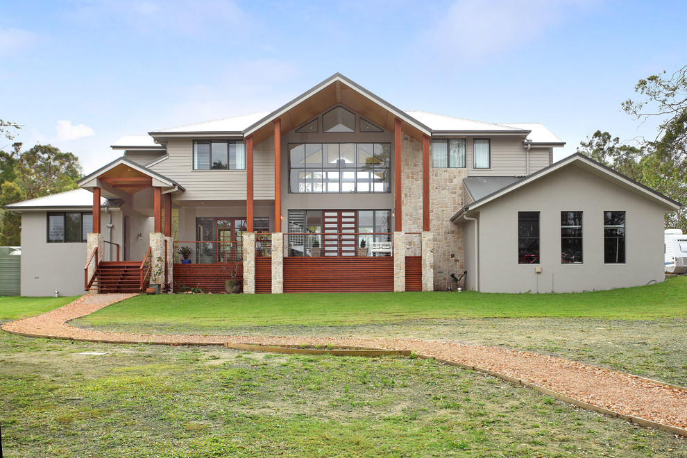 This is an example of a contemporary exterior in Gold Coast - Tweed with stone veneer.