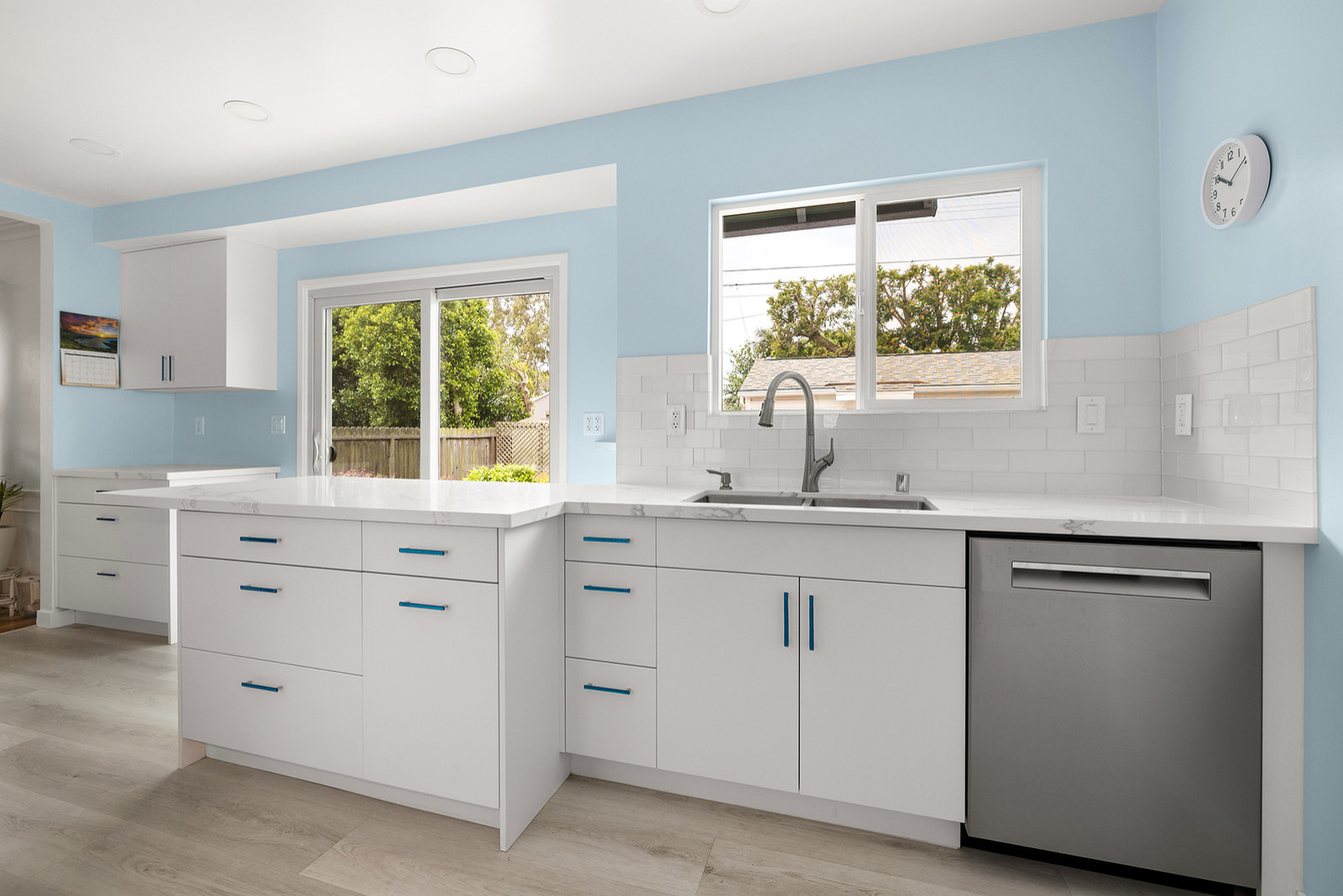 Cabinetry, Countertops, Tile Backsplash, Appliances and Plank Vinyl Laminate Flo