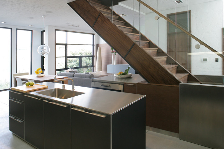 This is an example of a contemporary eat-in kitchen in San Francisco with an undermount sink and stainless steel appliances.