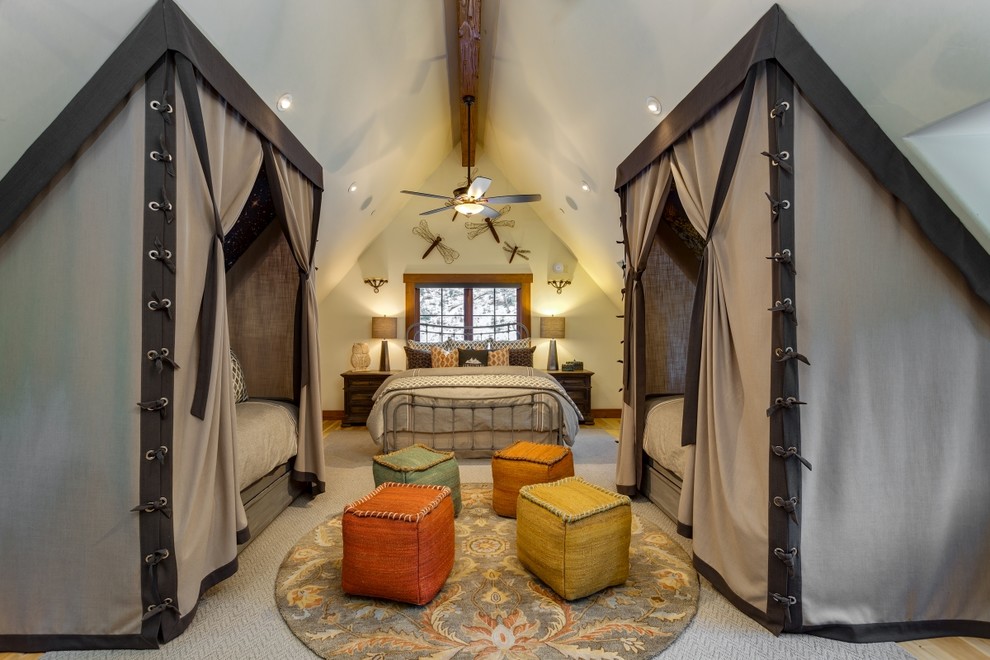 Large mountain style guest light wood floor and beige floor bedroom photo in Los Angeles with white walls