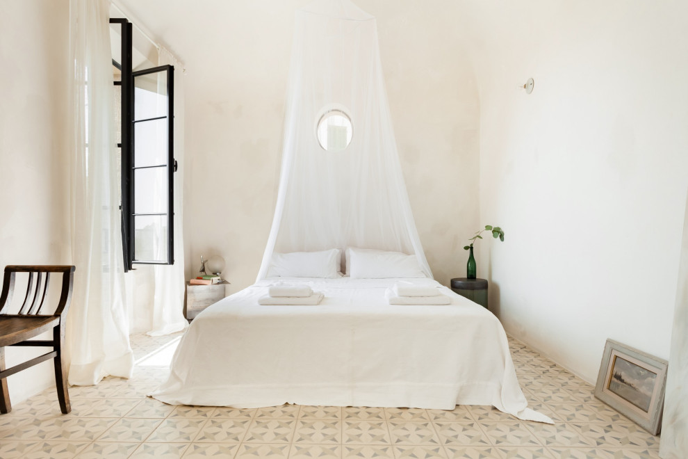 This is an example of a mediterranean bedroom in Other.