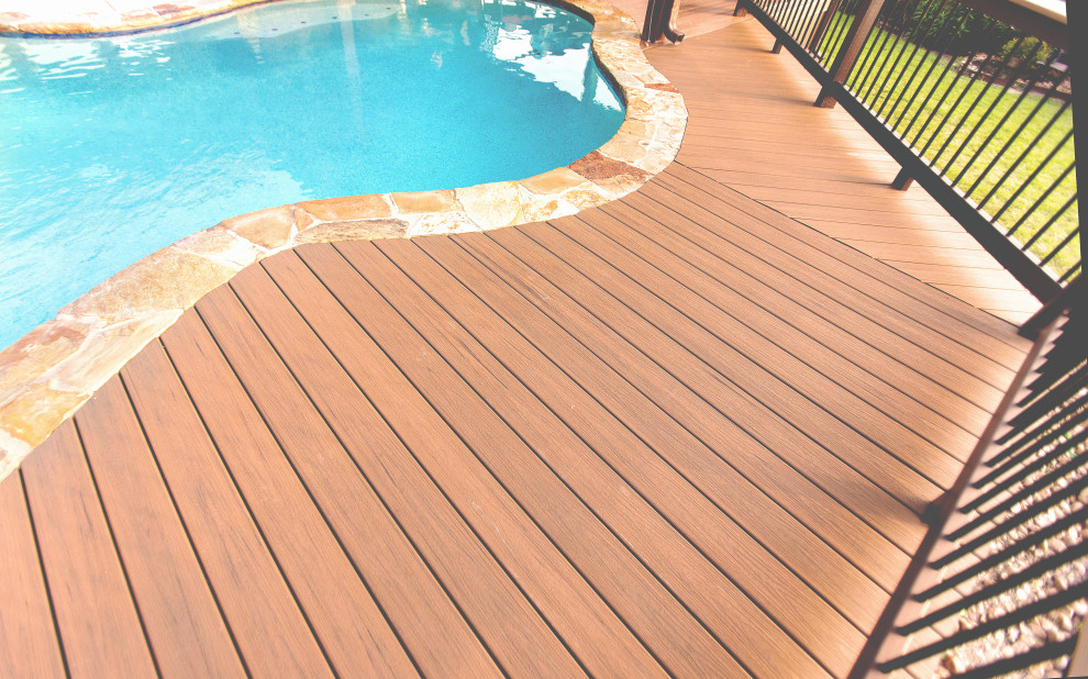 Small backyard ground level mixed material railing deck photo