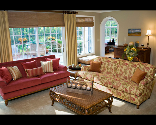 Inspiration for a farmhouse carpeted family room remodel in Other with a standard fireplace, a stone fireplace and a media wall