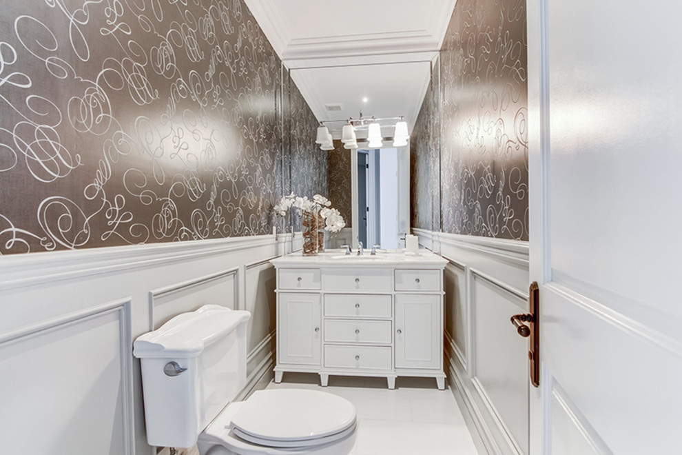 Photo of a traditional powder room in Toronto with white floor.