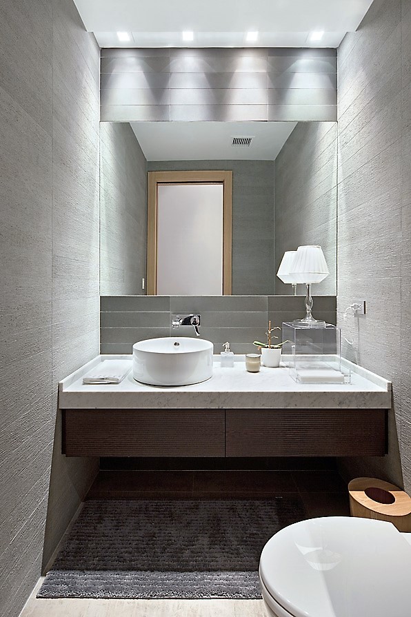 This is an example of a mediterranean powder room in New York.