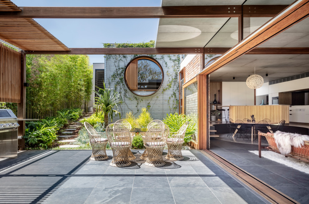 This is an example of a midcentury patio in Sydney.